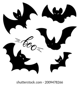 Black bats set and Boo lettering. Hand drawn illustration of night creatures bats. Halloween design element.