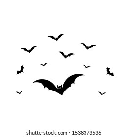 Black bats swarm isolated on white vector Halloween background. Silhouettes of flying bats traditional Halloween symbols on white.