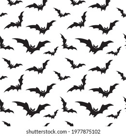 Black bats swarm isolated on white vector Halloween background. Flying fox night creatures illustration. Silhouettes of flying bats traditional Halloween symbols on white.