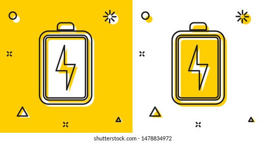 Black Battery icon isolated on yellow and white background. Lightning bolt symbol. Random dynamic shapes. Vector Illustration