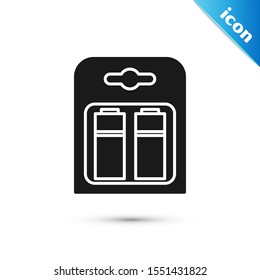 Black Battery in pack icon isolated on white background. Lightning bolt symbol.  Vector Illustration