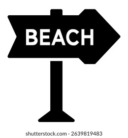 A black beach sign points to the right, showing the location of a beach. It indicates the direction to the beach.