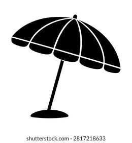 Black beach umbrella standing on sand