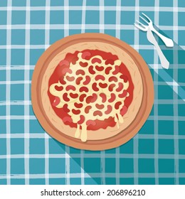 Black beans pizza on scotch table cloth