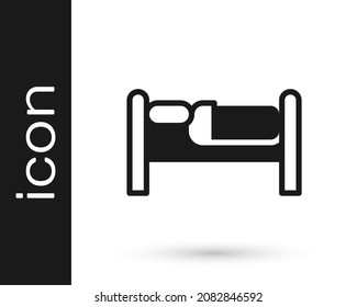 Icono de la cama negra aislado en fondo blanco.  Vector