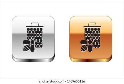 Black Bee and honeycomb icon isolated on white background. Honey cells. Sweet natural food. Honeybee or apis with wings symbol. Flying insect. Silver-gold square button. Vector Illustration