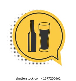 Black Beer bottle and glass icon isolated on white background. Alcohol Drink symbol. Yellow speech bubble symbol. Vector.