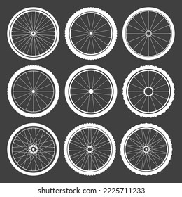 Black bicycle wheel symbols collection. Bike rubber tyre silhouettes. Fitness cycle, road and mountain bike. Vector illustration.
