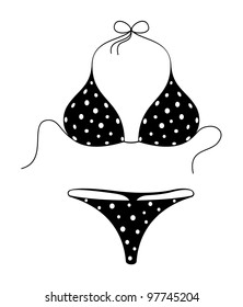 Trato negro de bikini con puntos blancos