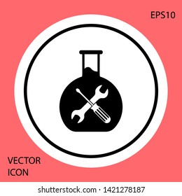 Black Bioengineering with screwdriver and wrench icon isolated on red background. Adjusting, service, setting, maintenance, repair, fixing. White circle button. Vector Illustration