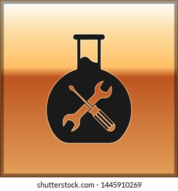Black Bioengineering with screwdriver and wrench icon isolated on gold background. Adjusting, service, setting, maintenance, repair, fixing.  Vector Illustration