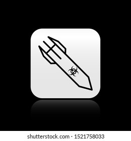Black Biohazard rocket icon isolated on black background. Rocket bomb flies down. Silver square button. Vector Illustration