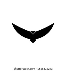 Black bird icon. Flying bird with expanded wings. Vector isolated on white