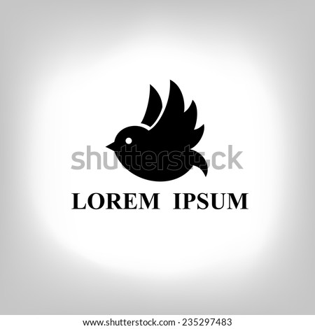Black bird isolated with expanded wings. Logo design for company.