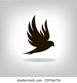 Black bird isolated with outstretched wings. Logo design for company.