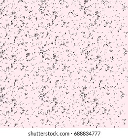 Black blots on a pink background