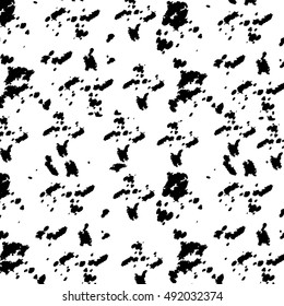 Black blots on a white background.  Seamless pattern. Vector illustration.