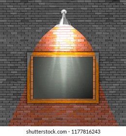 Black board on a brick wall with illumination.