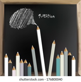 Black board with pastels. 