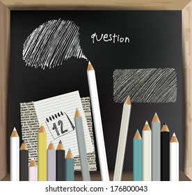 Black board with pastels. 