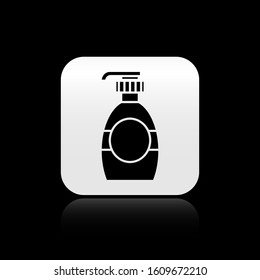 Black Bottle of liquid antibacterial soap with dispenser icon isolated on black background. Disinfection, hygiene, skin care concept. Silver square button. Vector Illustration