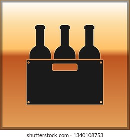 Black Bottles of wine in a wooden box icon isolated on gold background. Wine bottles in a wooden crate icon. Vector Illustration