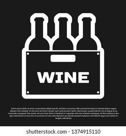 Black Bottles of wine in a wooden box icon isolated on black background. Wine bottles in a wooden crate icon. Vector Illustration