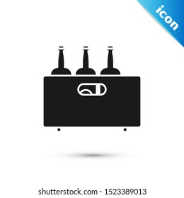 Black Bottles of wine in a wooden box icon isolated on white background. Wine bottles in a wooden crate icon.  Vector Illustration
