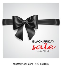 Black bow with horizontal ribbon with shadow and inscription Black Friday Sale on gray background