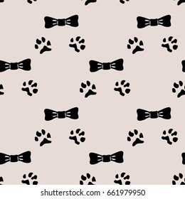 Black bow ties and dog paw prints on pink background seamless pattern vector.Flat hand drawn design.
