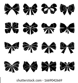 Black bows from a wide ribbon. Decor for greeting cards for birthday, christmas, new year. Gifts on sale, prize to winner