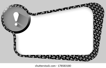 black box with texture of multiply squares and exclamation mark