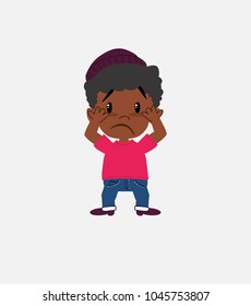 Black boy in jeans, scared.