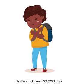 Black boy standing alone with upset feelings.