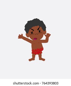 Black boy in a swimsuit argues something with a gesture of discontent.
