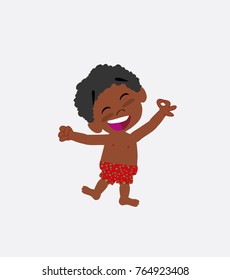 Black boy in a swimsuit exulting in happiness
