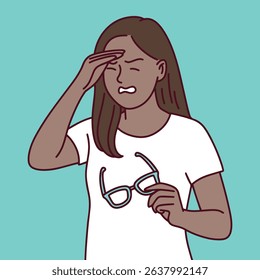 black brown dark skinned woman rubs her eyes while holding glasses, showing fatigue, mental exhaustion, or stress symptoms