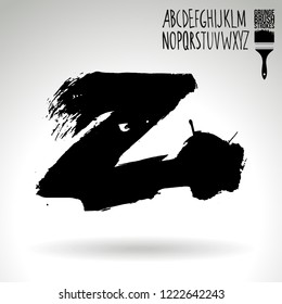 Black brush stroke and handwritten alphabet. Grunge vector abstract hand - painted element. Underline and border design.