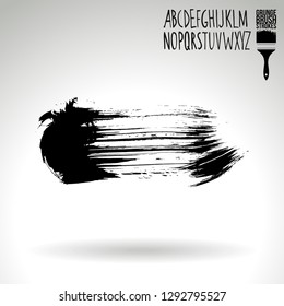 Black brush stroke and handwritten alphabet. Grunge vector abstract hand - painted element. Underline and border design.