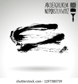 Black brush stroke and handwritten alphabet. Grunge vector abstract hand - painted element. Underline and border design.