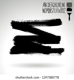 Black brush stroke and handwritten alphabet. Grunge vector abstract hand - painted element. Underline and border design.