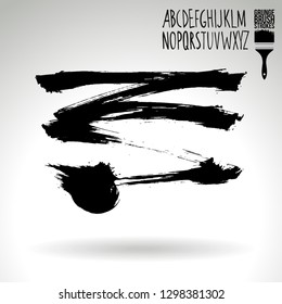 Black brush stroke and handwritten alphabet. Grunge vector abstract hand - painted element. Underline and border design.