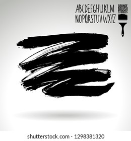 Black brush stroke and handwritten alphabet. Grunge vector abstract hand - painted element. Underline and border design.
