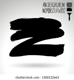 Black brush stroke and handwritten alphabet. Grunge vector abstract hand - painted element. Underline and border design.