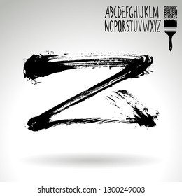 Black brush stroke and handwritten alphabet. Grunge vector abstract hand - painted element. Underline and border design.