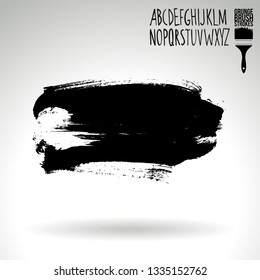 Black brush stroke and handwritten alphabet. Grunge vector abstract hand - painted element. Underline and border design.