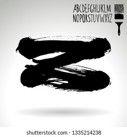 Black brush stroke and handwritten alphabet. Grunge vector abstract hand - painted element. Underline and border design.