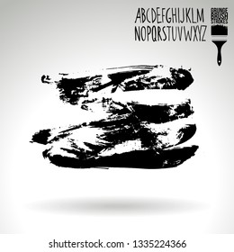 Black brush stroke and handwritten alphabet. Grunge vector abstract hand - painted element. Underline and border design.