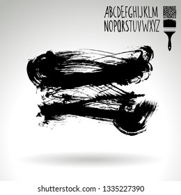 Black brush stroke and handwritten alphabet. Grunge vector abstract hand - painted element. Underline and border design.