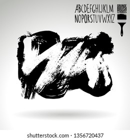 Black brush stroke and handwritten alphabet. Grunge vector abstract hand - painted element. Underline and border design.